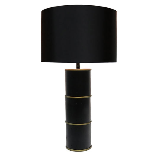 Table lamp with cylindrical base, brass detailing and classic black shade.
